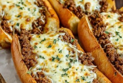 Thumbnail for Cheesy Sloppy Joe Garlic Bread